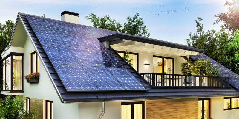 Solar panels on the gable roof of a beautiful modern home